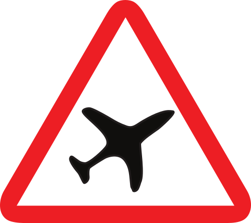Señal vertical de advertencia de peligro por la proximidad de un aeropuerto