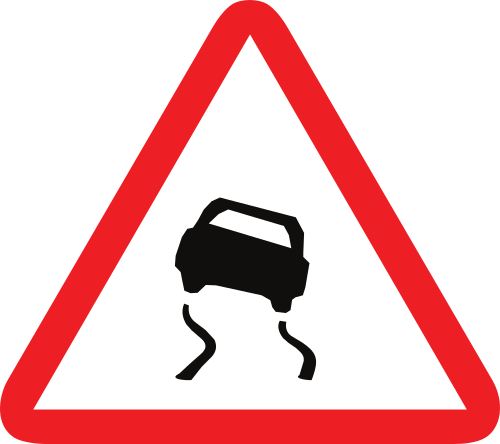 Señal vertical de advertencia de peligro por la proximidad de pavimento deslizante